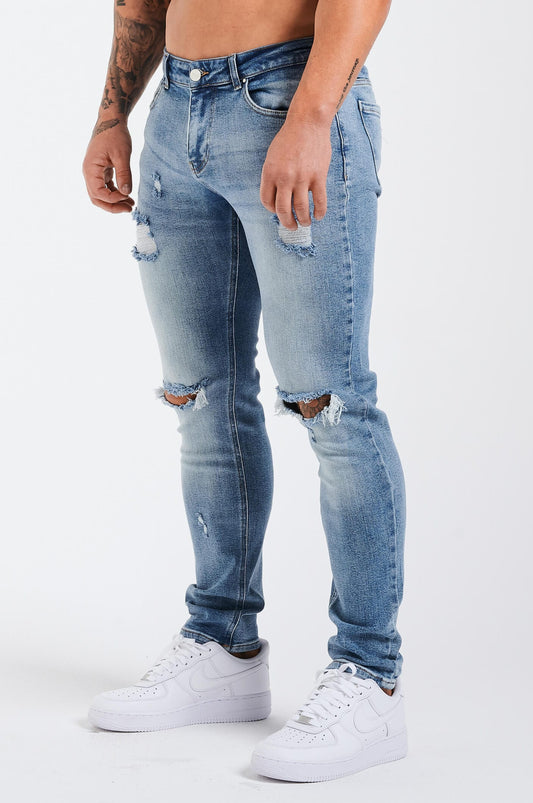 SLIM FIT ΤΖΙΝ 2.0 ΣΚΙΣΜΕΝΟ ΚΑΙ ΕΠΙΔΙΟΡΘΩΜΕΝΟ - ΜΠΛΕ ΜΕΣΑΙΟ